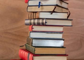 stack-various-books-table_1252-710
