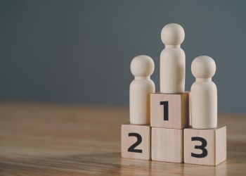 wooden figures peg doll standing on the podium 1st, 2nd, 3rd pos