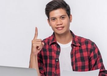 man-using-laptop-office-doing-document-analysis_1150-26848