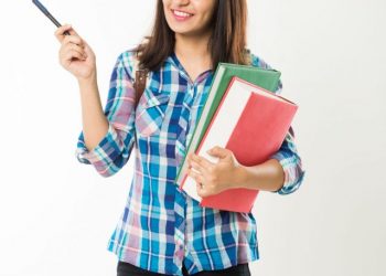 Pretty,Indian/asian,College,Girl,Holding,Books,And,Bag,While,Standing